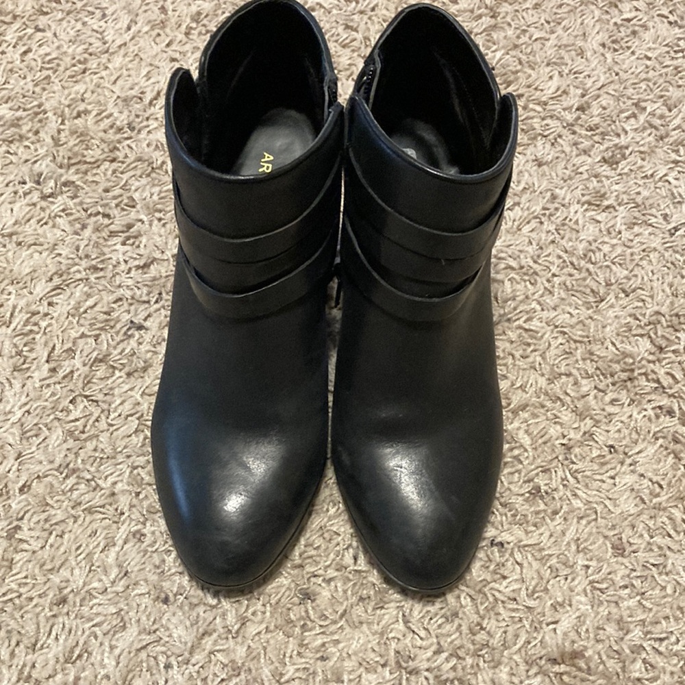 Black leather booties.